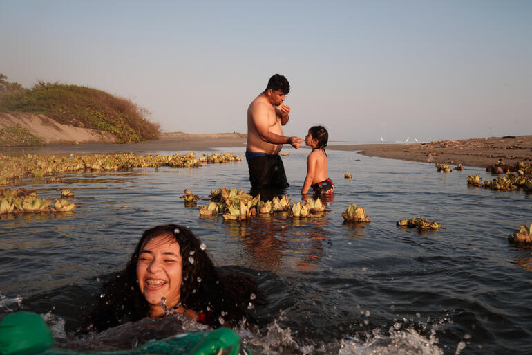 The Ortega family spends Sunday at the beach. Michoacan, Mexico. 2021.